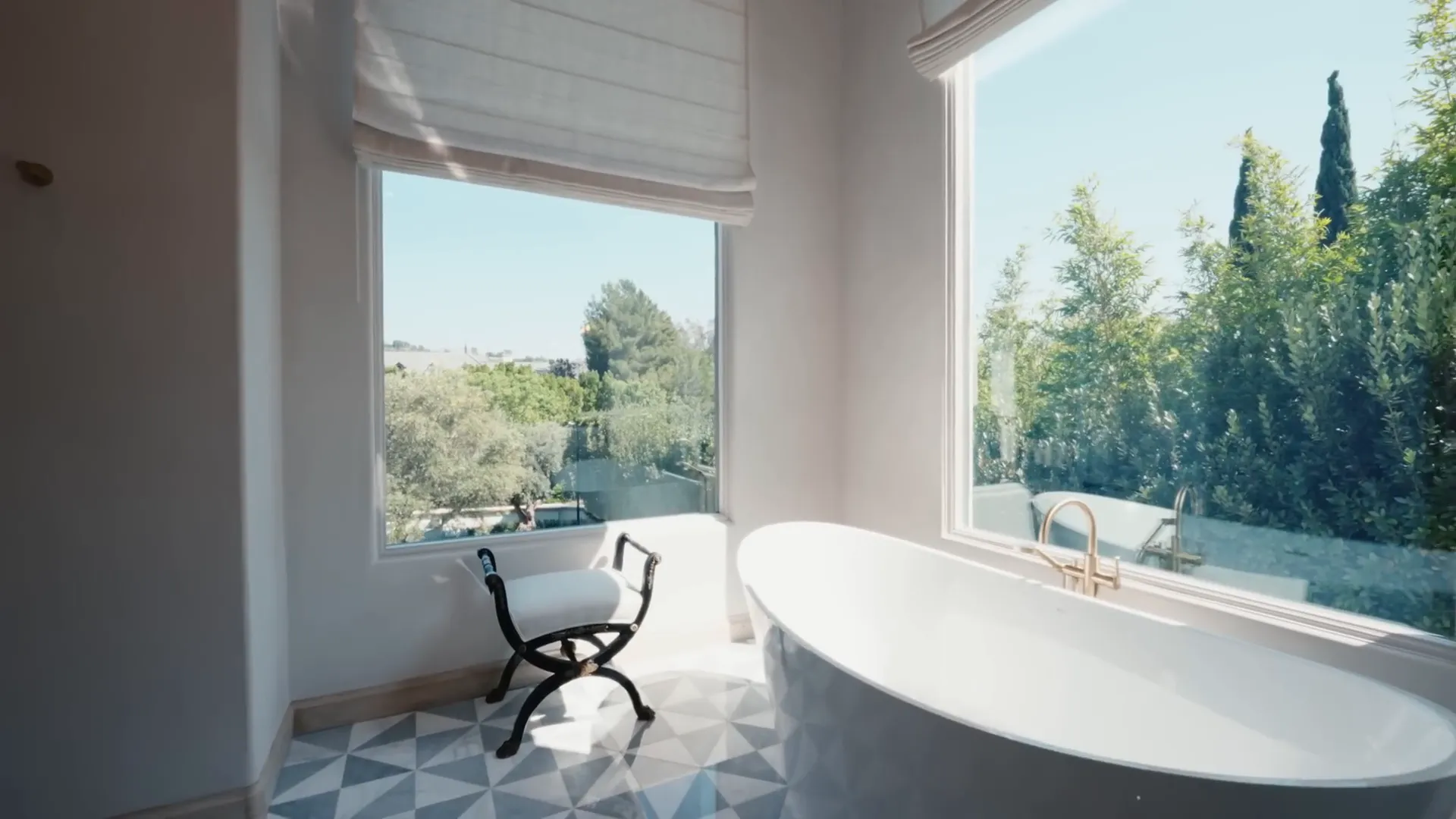 Sofía Vergara admiring her luxurious bathroom.