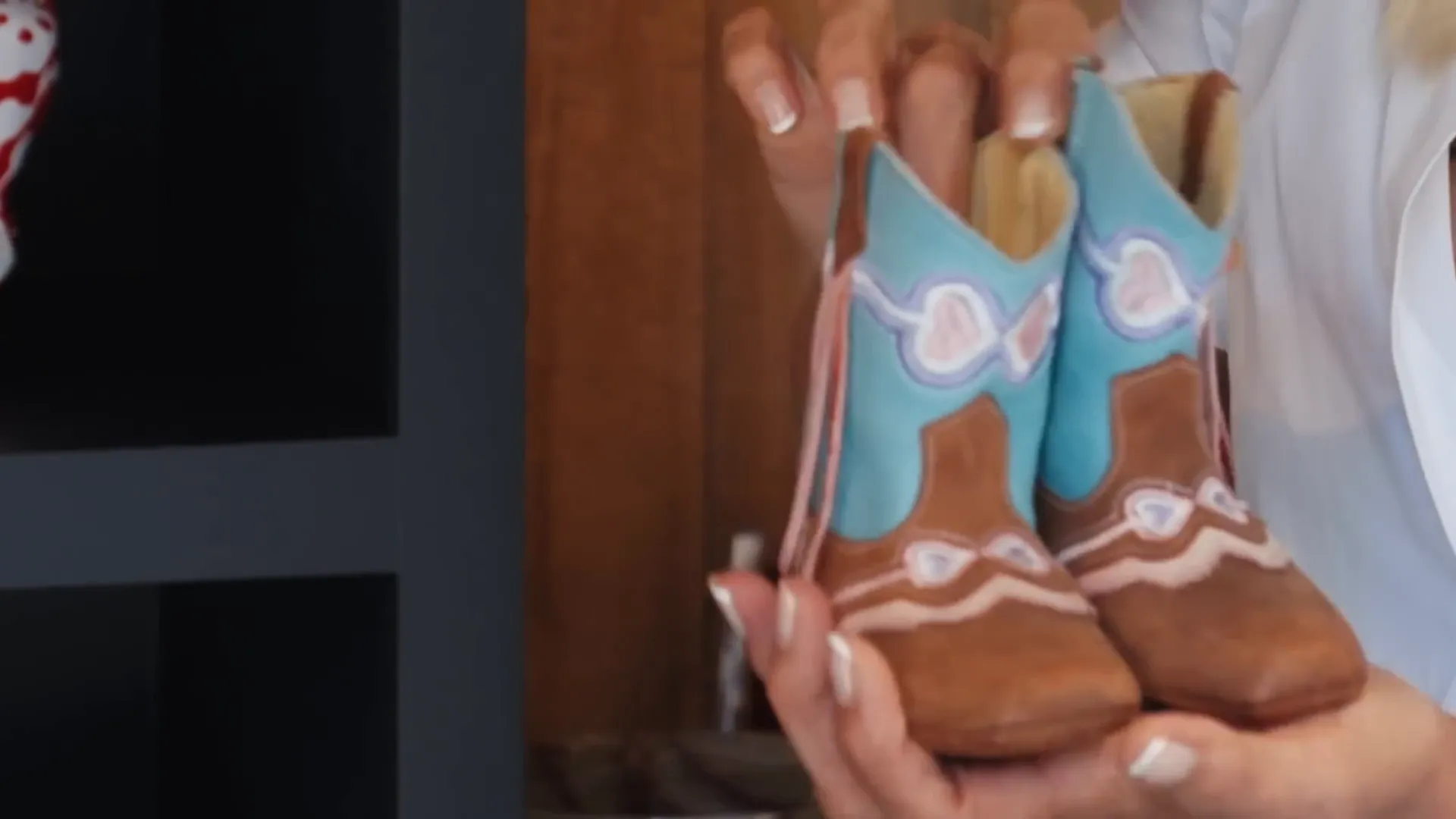 Kai's first cowboy boots in the bunk room