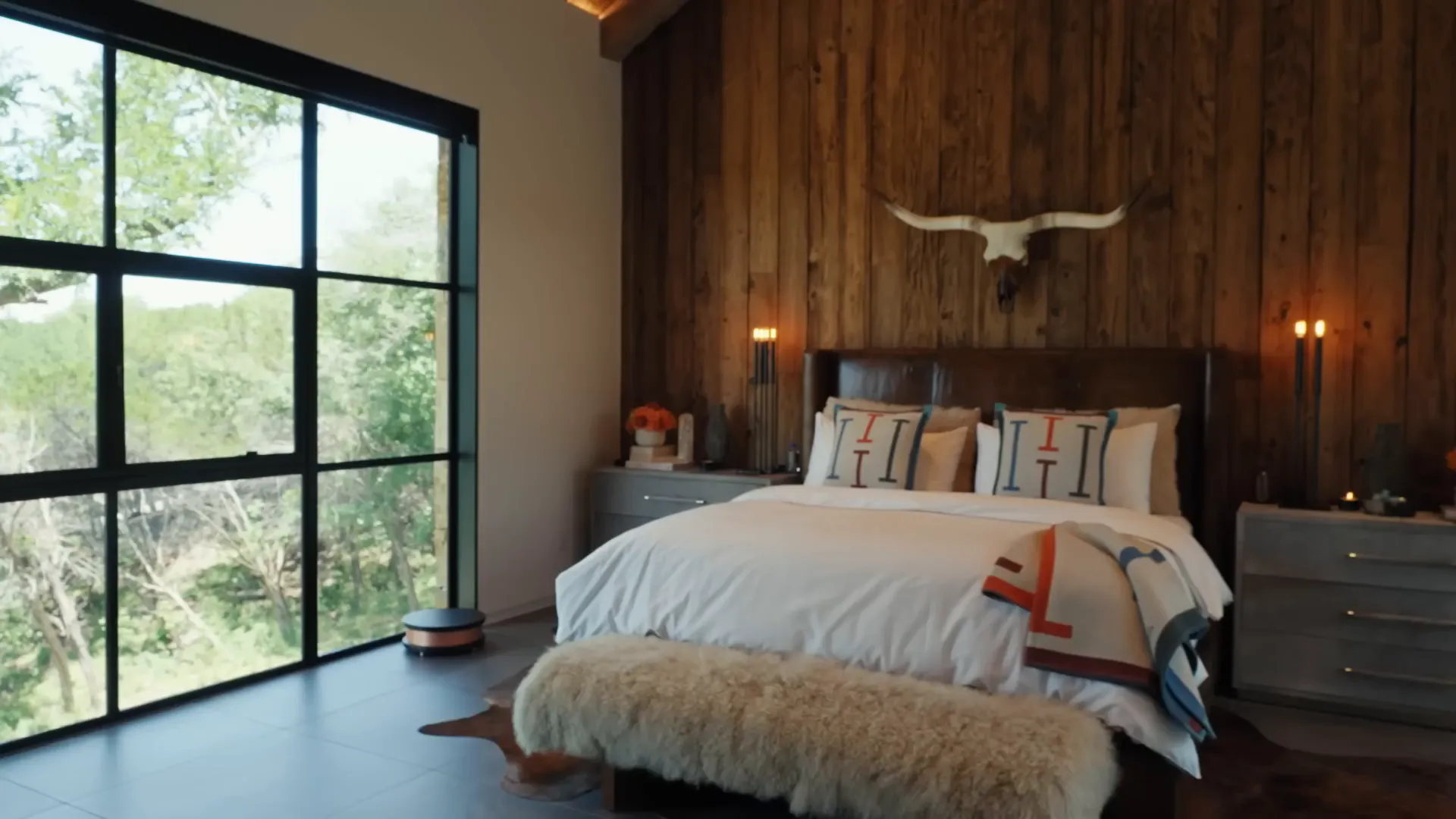 Cozy primary bedroom with river view