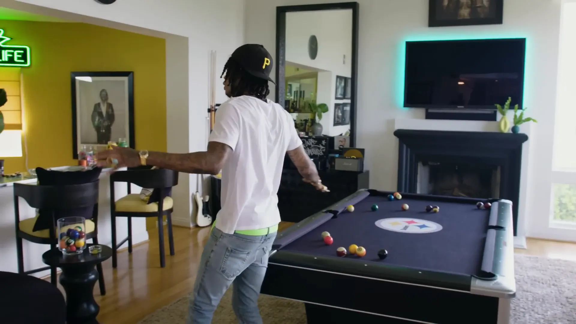Game room with pool table and memorabilia