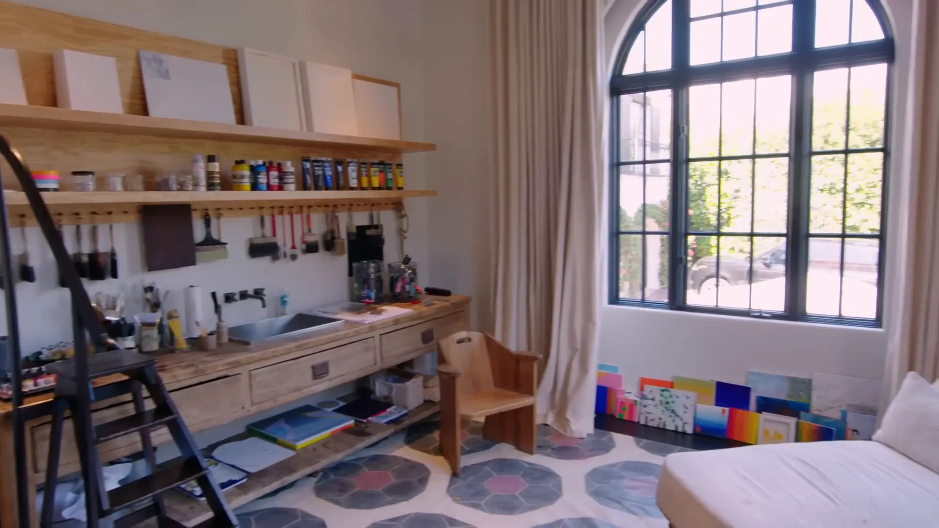 Art studio filled with painting supplies