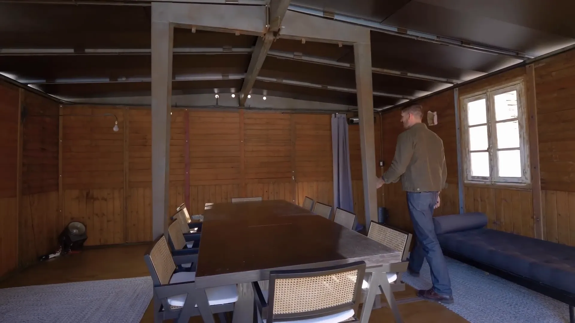 Dining setup inside the shed with mountain views