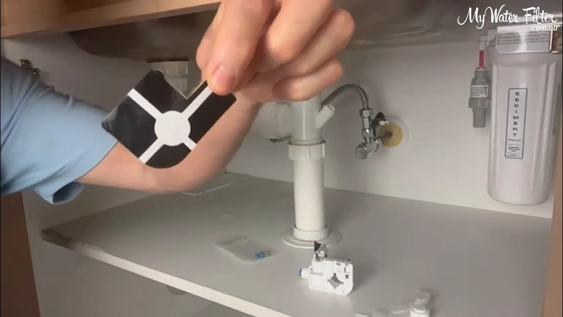 Peeling sticky backing and matching pattern to allow water flow