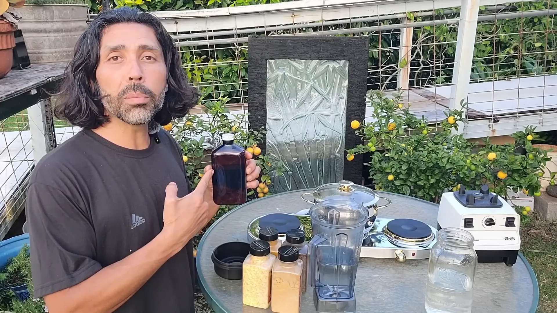 Adding water and ingredients to blender
