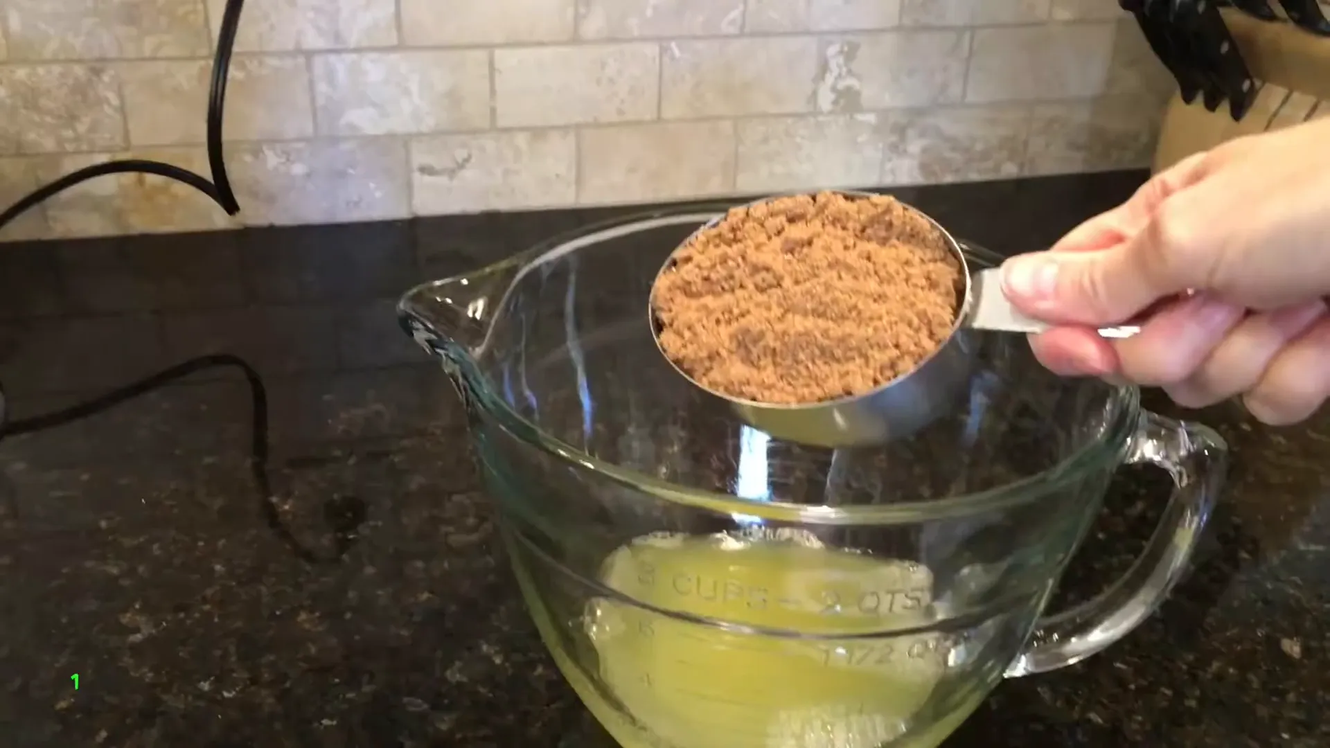 Adding brown sugar to the pineapple juice.