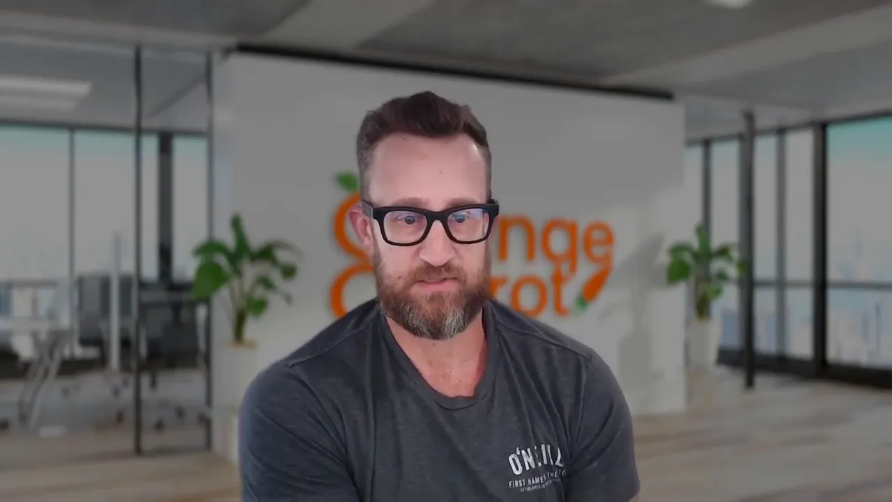 Centered presenter in a branded virtual office background talking to camera