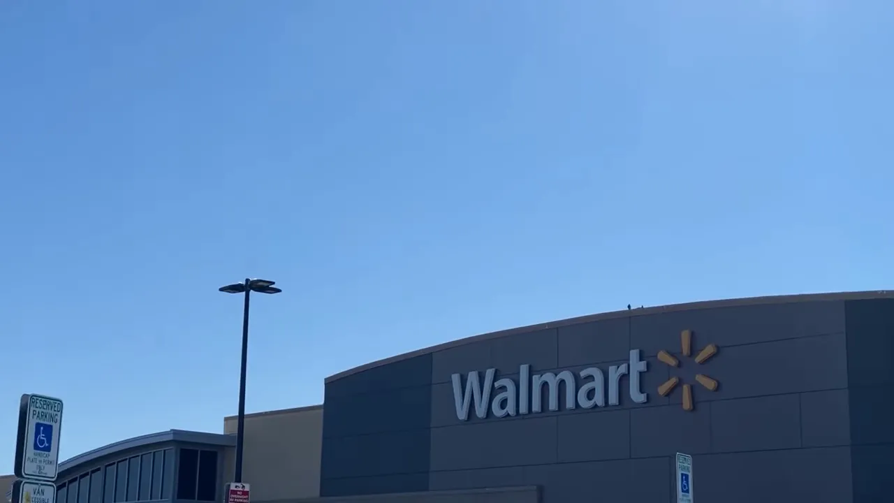 Intersection view on Glassford Hill with active traffic, construction fencing and apartment complexes.