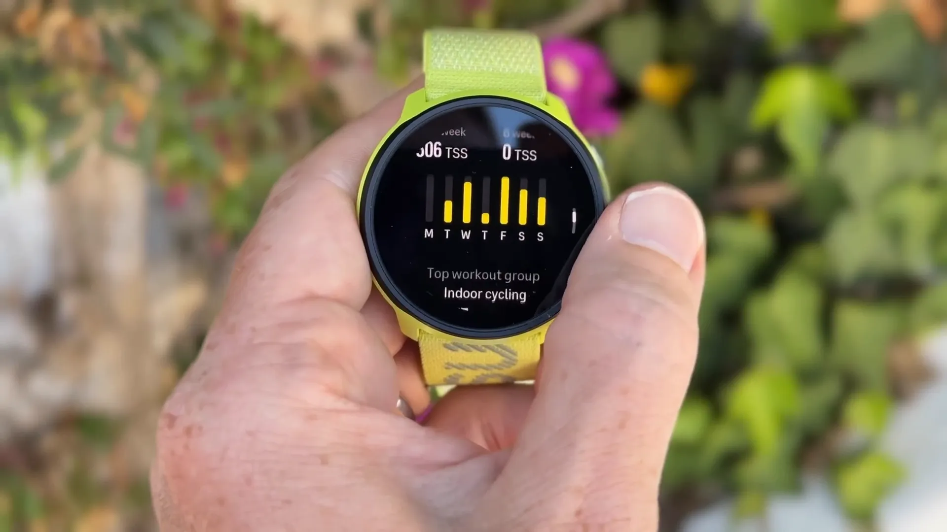 Suunto Run GPS watch on wrist showing running metrics