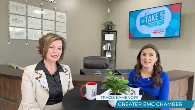 Tracie Kamenoff and Katrina Kirkpatrick seated at a round table in an office