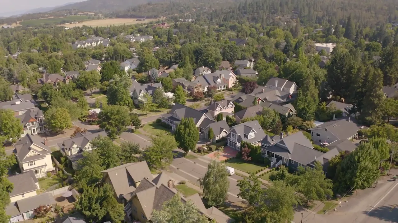 Google Earth aerial map of Southern Oregon with labels for Grants Pass, Rogue River, Medford, Ashland and Eagle Point.