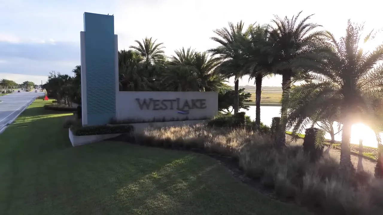 Gated Cresswind entrance with palm-lined streets