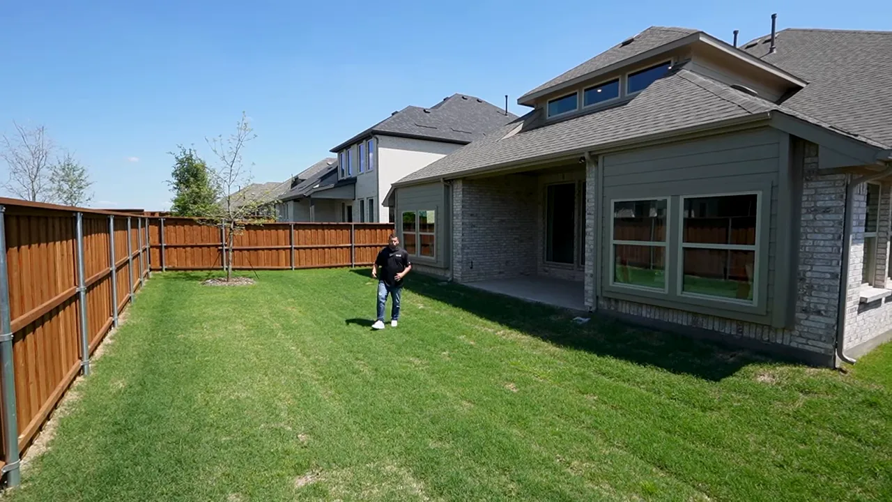 Covered patio and average DFW backyard showing good space for outdoor living