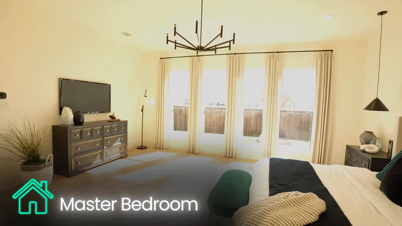 Home study with double doors open, armchairs, shelving and doorway to adjacent rooms