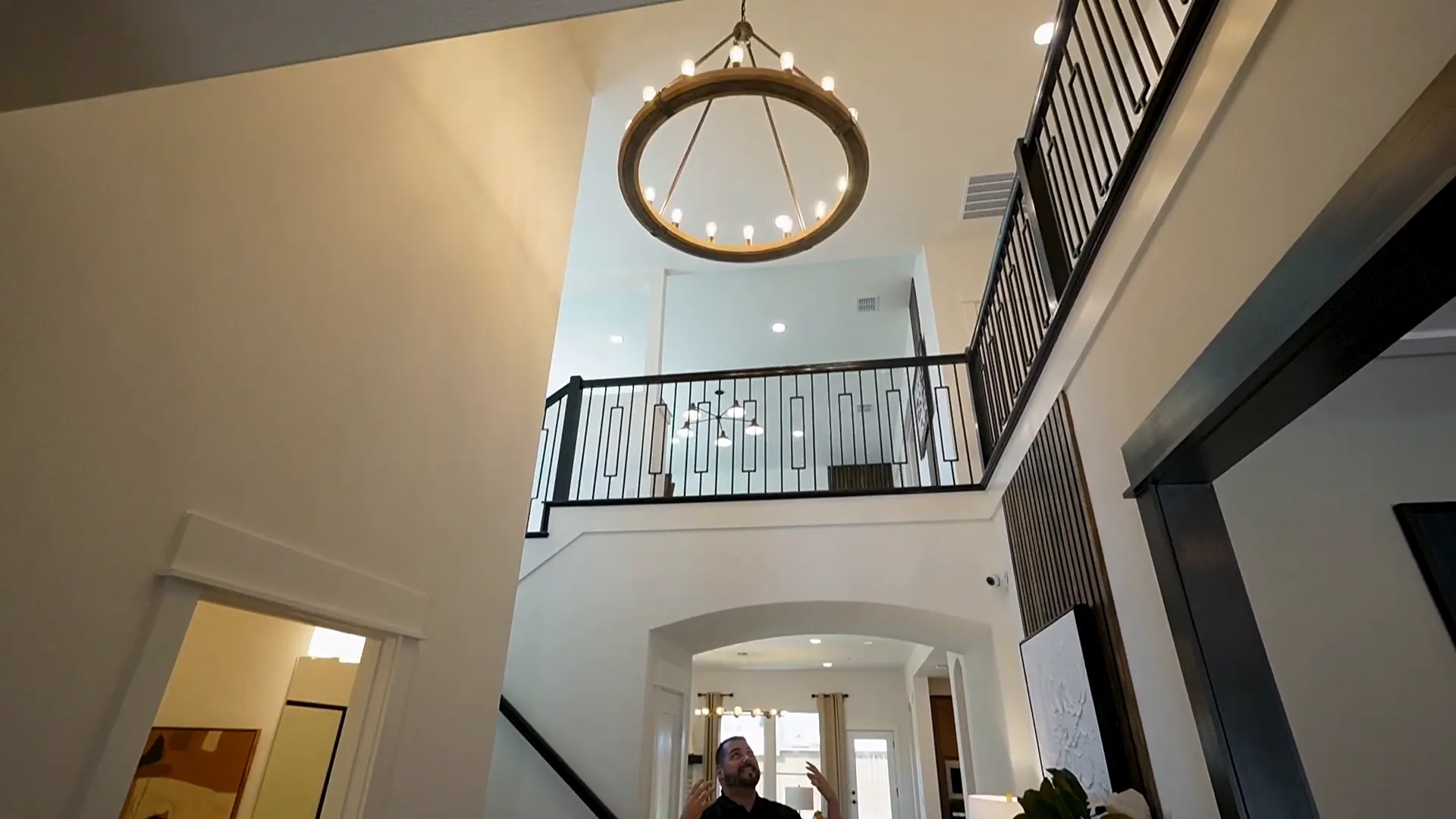 Open two-story ceiling with open railing system