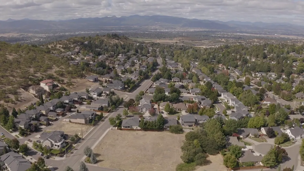 A resident explaining travel and airport challenges