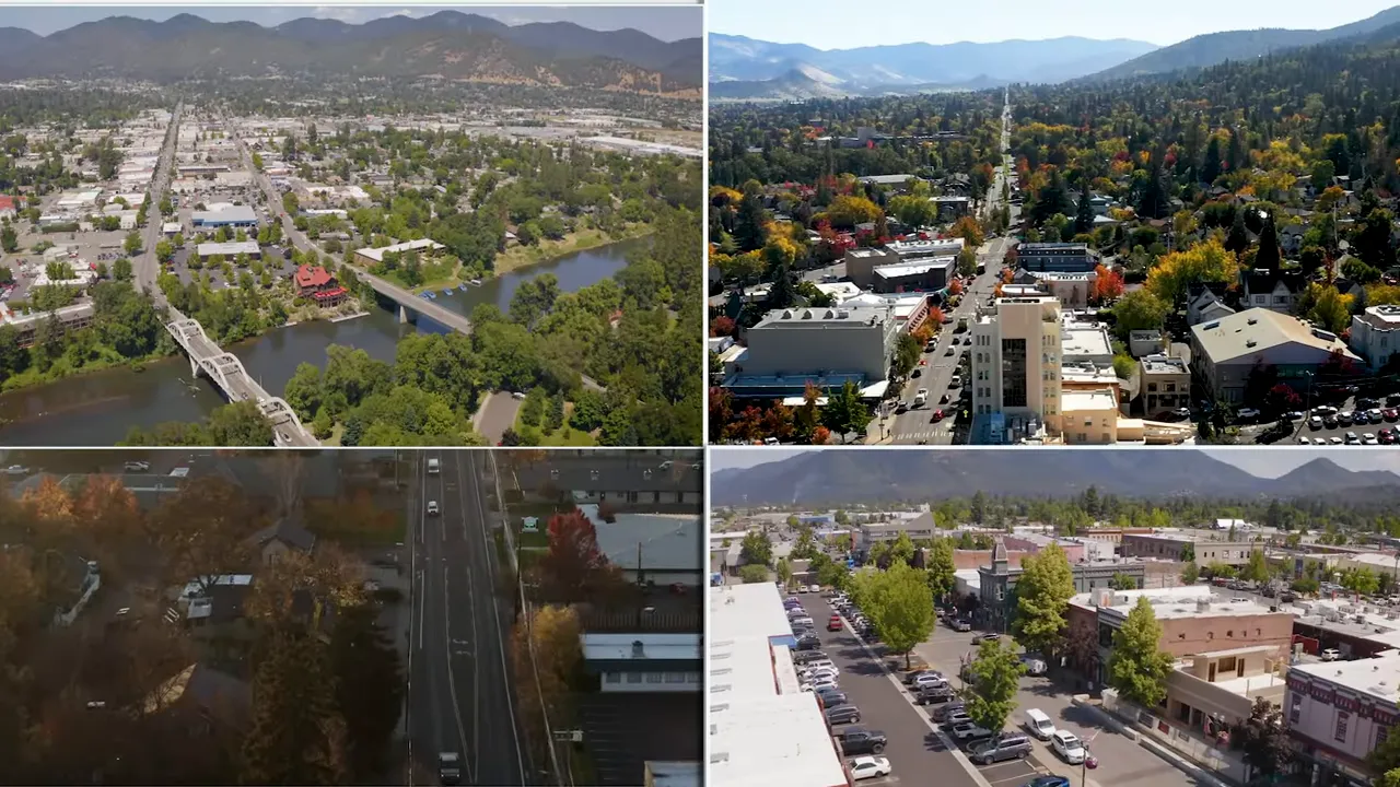 Presenter pointing to a whiteboard supply and demand diagram showing shifts in supply and demand