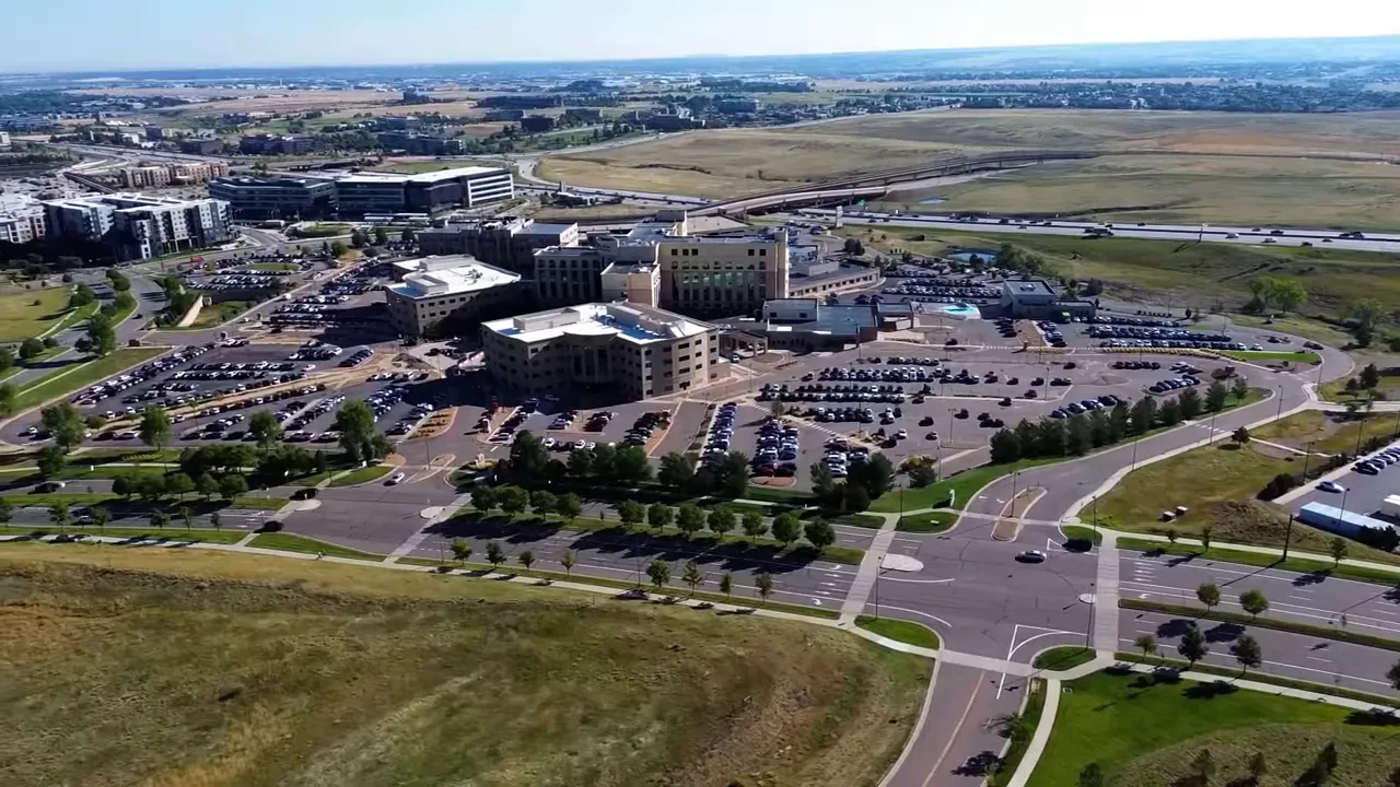 Aerial view of Lone Tree, Colorado neighborhood with open space and upscale housing