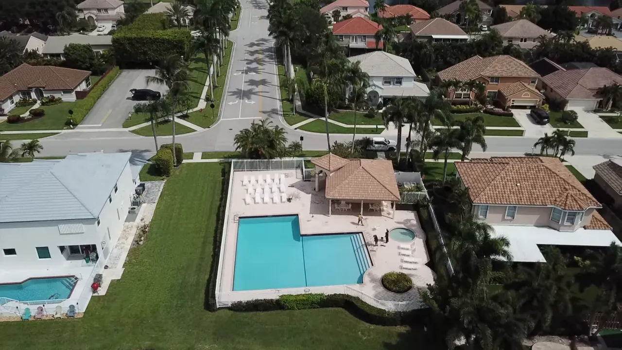 top-down aerial of Le Palais lake and surrounding streets