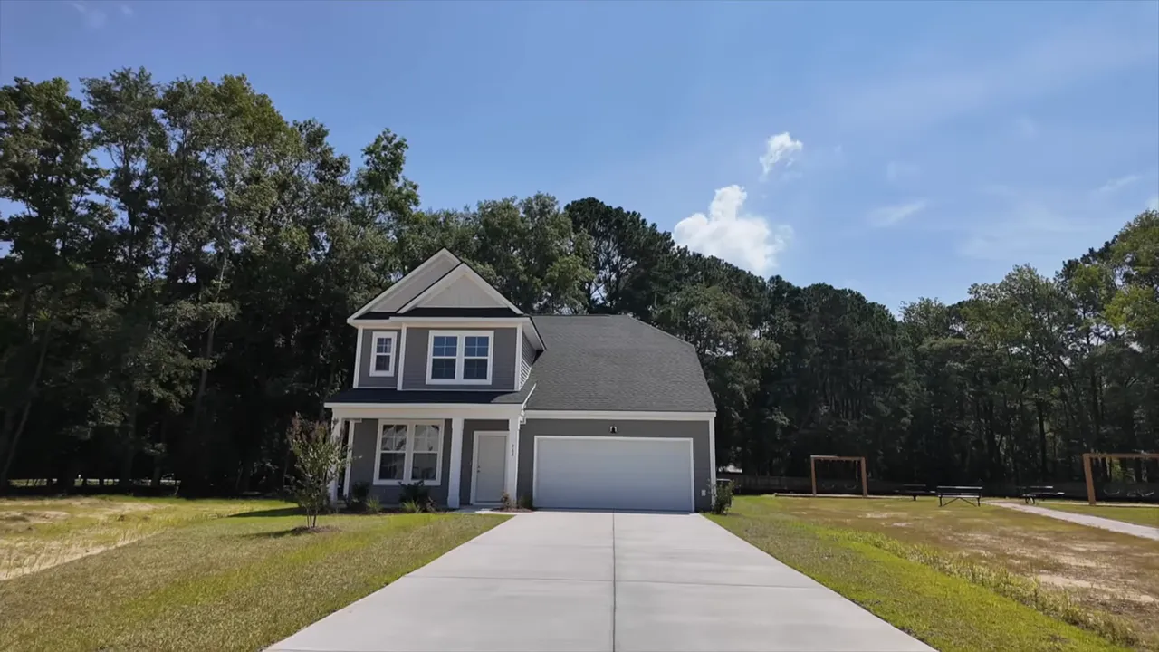 Front exterior of two story home with overlay showing 5 bedroom 35 bath 3003