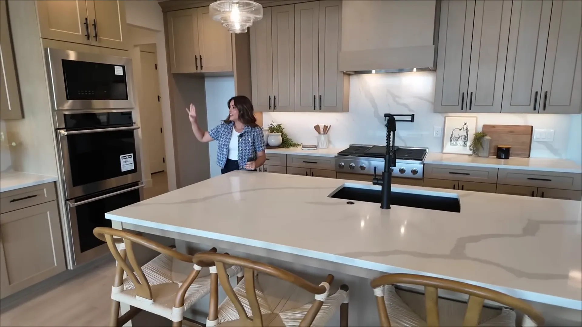 Large kitchen island with seating and natural light