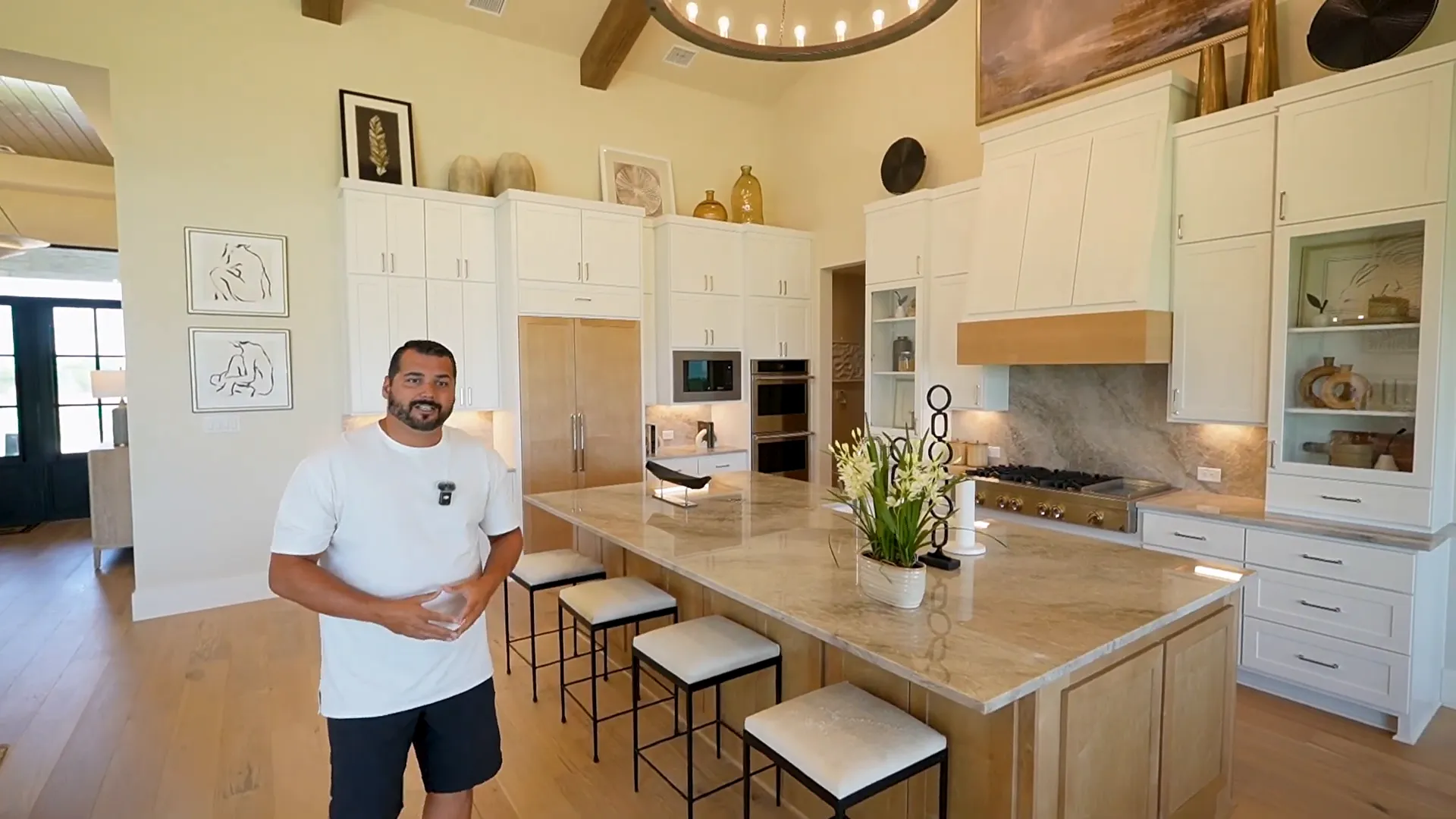 Two-tone kitchen island with quartzite countertops