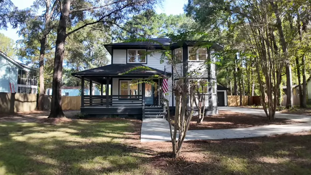 Renovated Summerville home exterior with James Hardie siding, side deck and detached garage