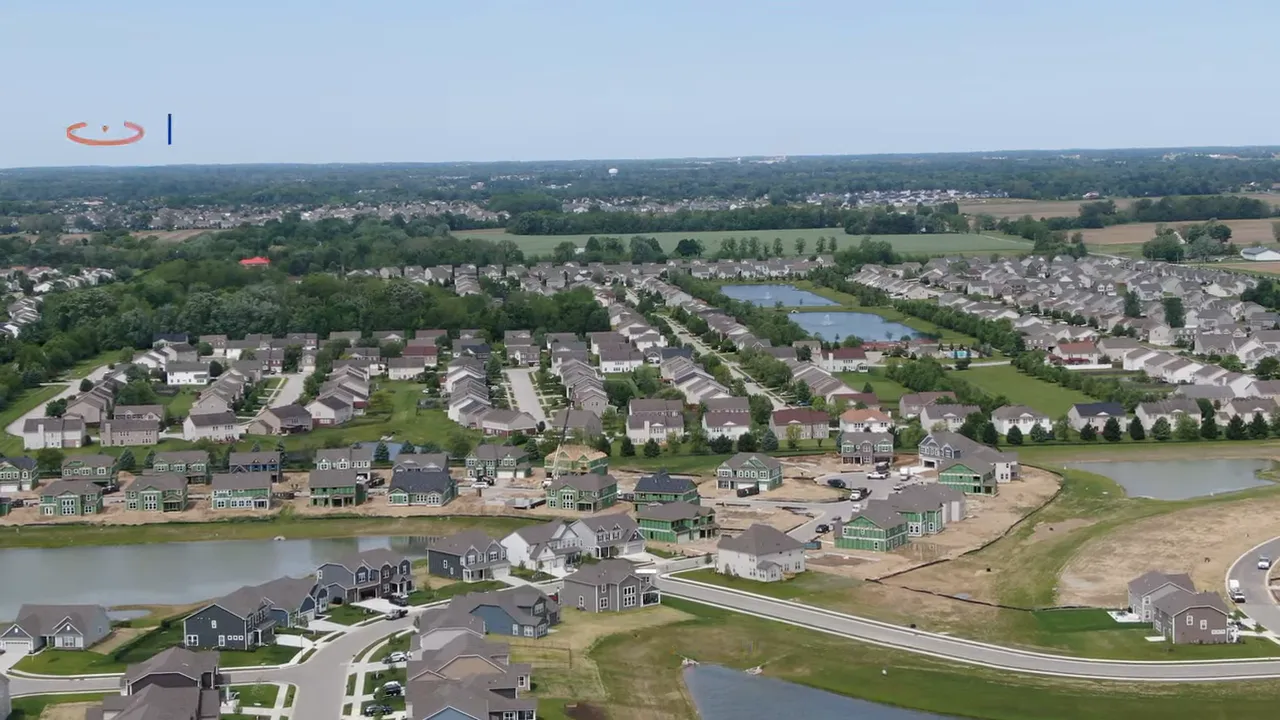 Indianapolis home search map filtered by school district showing property listings