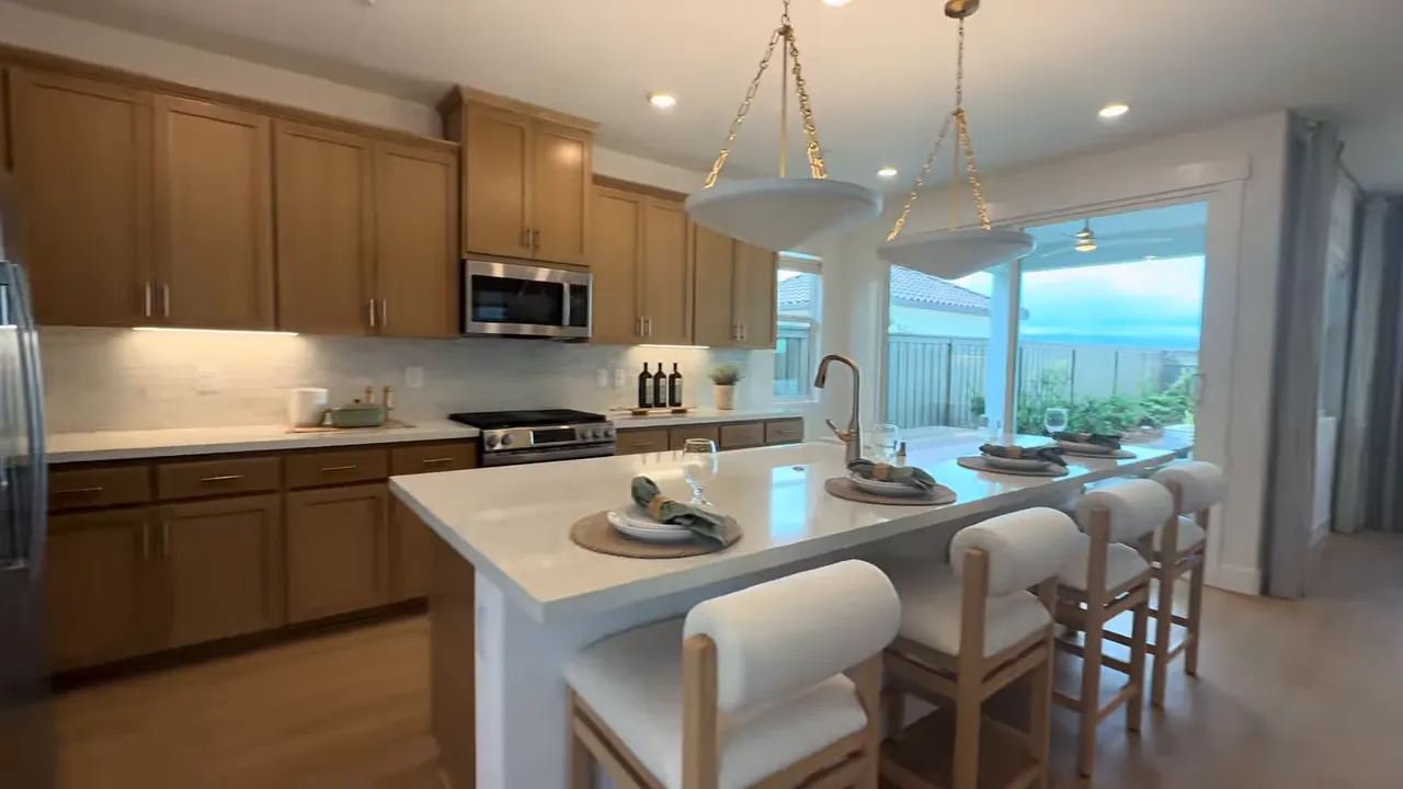 Pantry shelves and storage cubbies in the Merrick floor plan at Ashbourne at Ellis in Tracy CA
