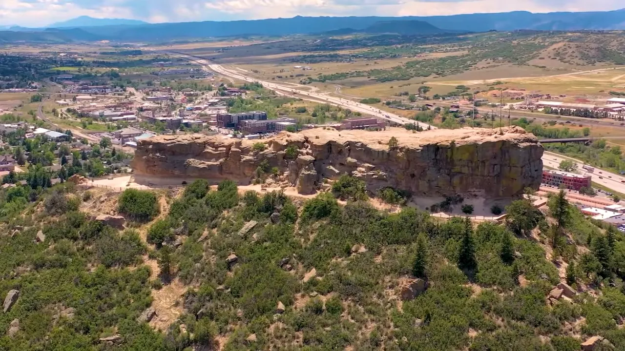 Commercial development scene labeled Brickyard Castle Rock during a real estate presentation