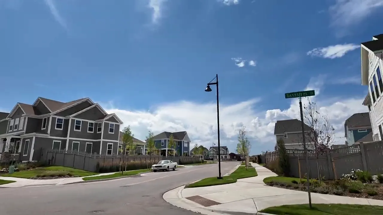 Row of newly built homes along a neighborhood street