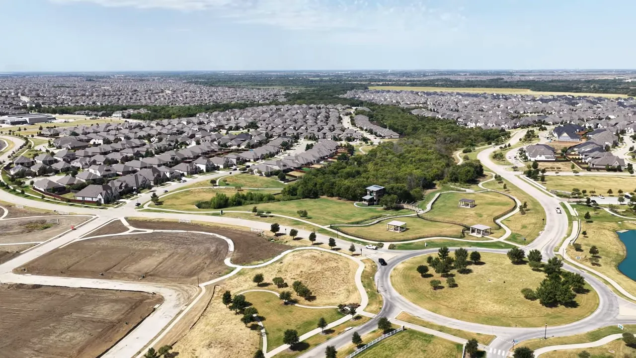 Aerial view labeled Sandbrock Ranch with neighborhood roads and green space