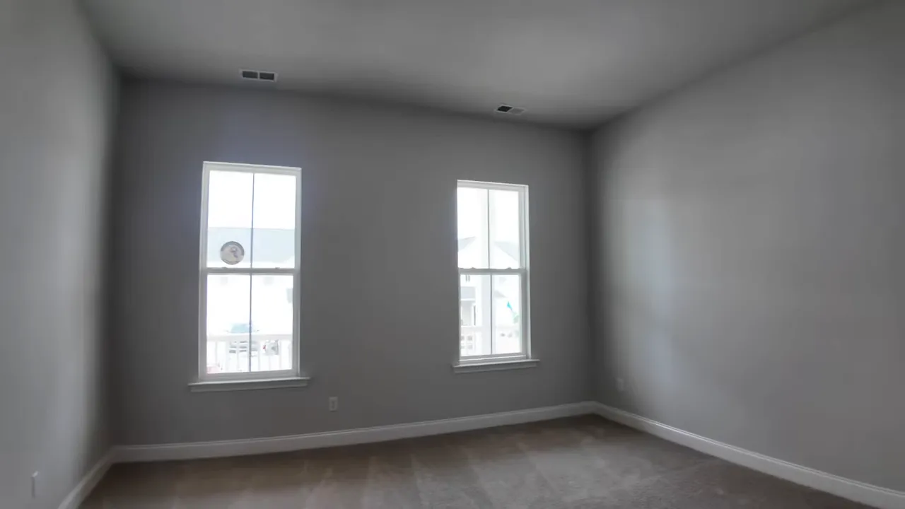 Walkthrough of primary suite frameless glass shower in a Summers Corner home