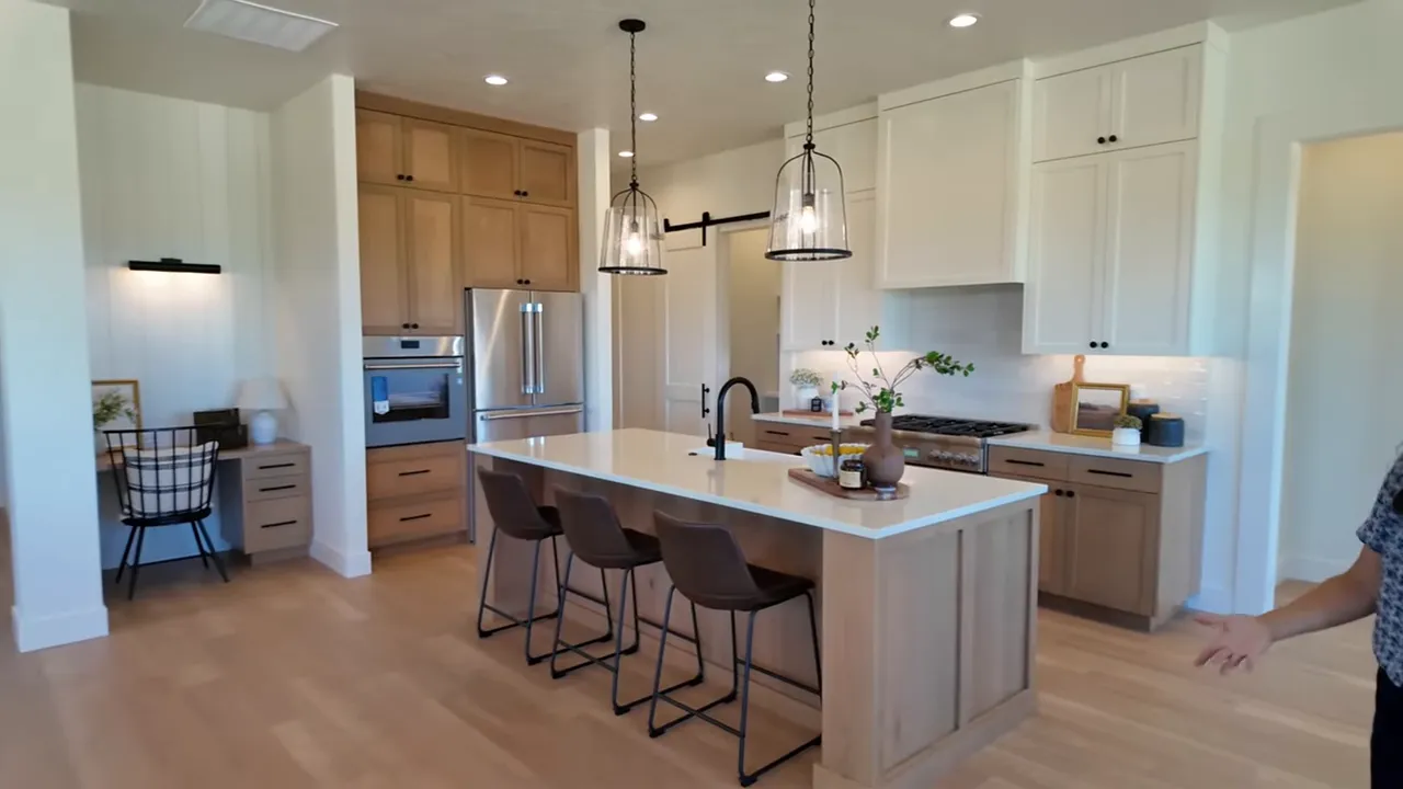 Kitchen island and Thermador range with custom hood