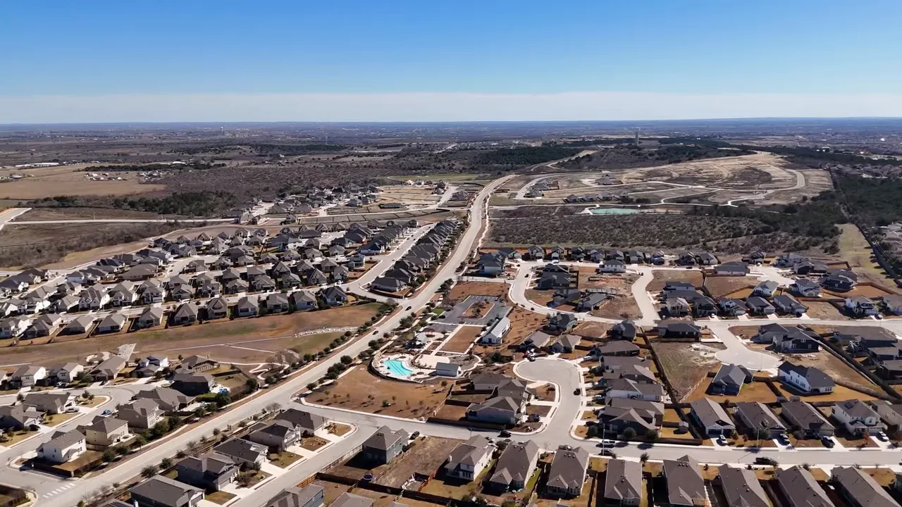Presenter centered on camera with a green '6 Checkpoints to Evaluate New Construction & The Deal' text overlay