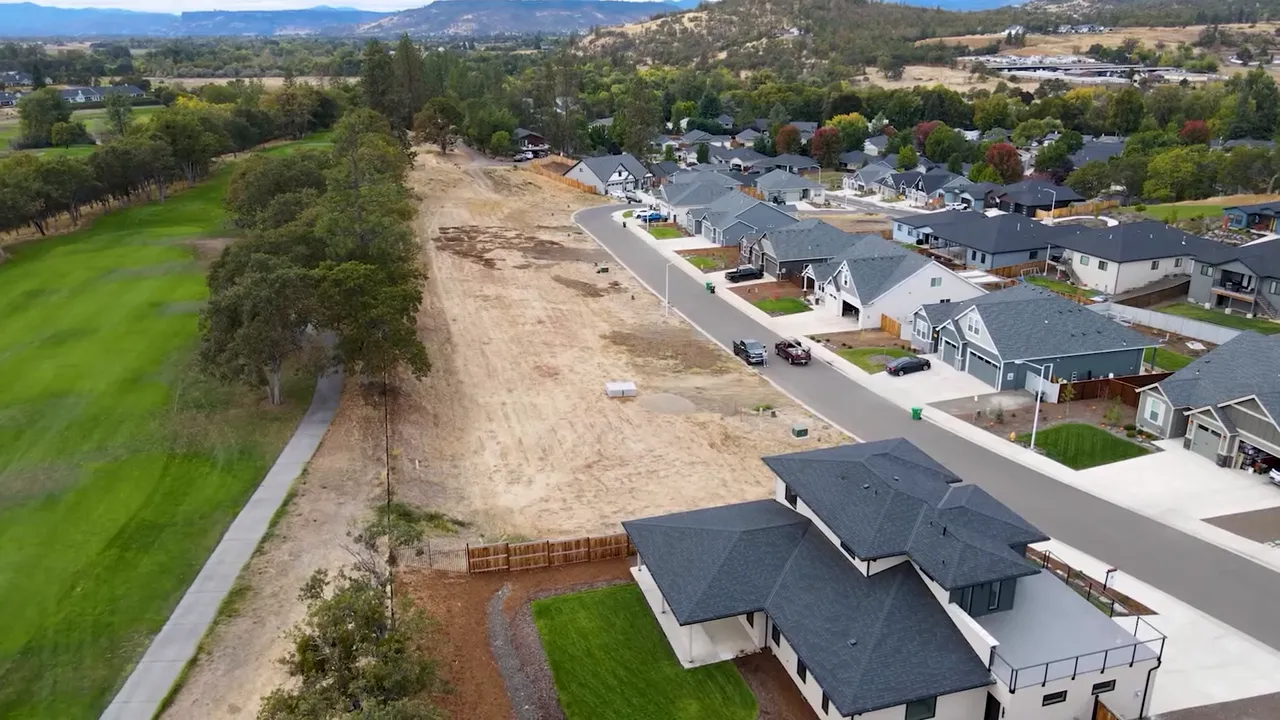 Video still showing presenter with large on-screen text '30 YEAR MORTGAGE' highlighting the current mortgage term