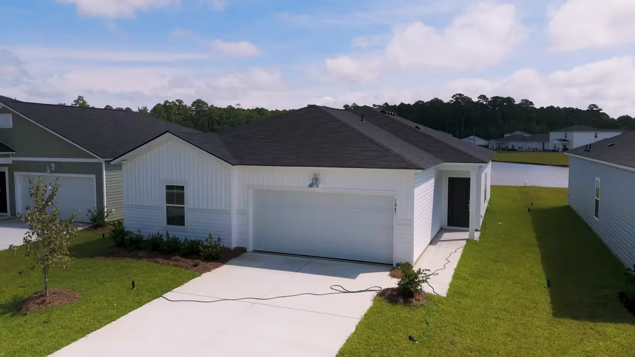 Side patio and walkway exterior view of a new construction home in Little River SC