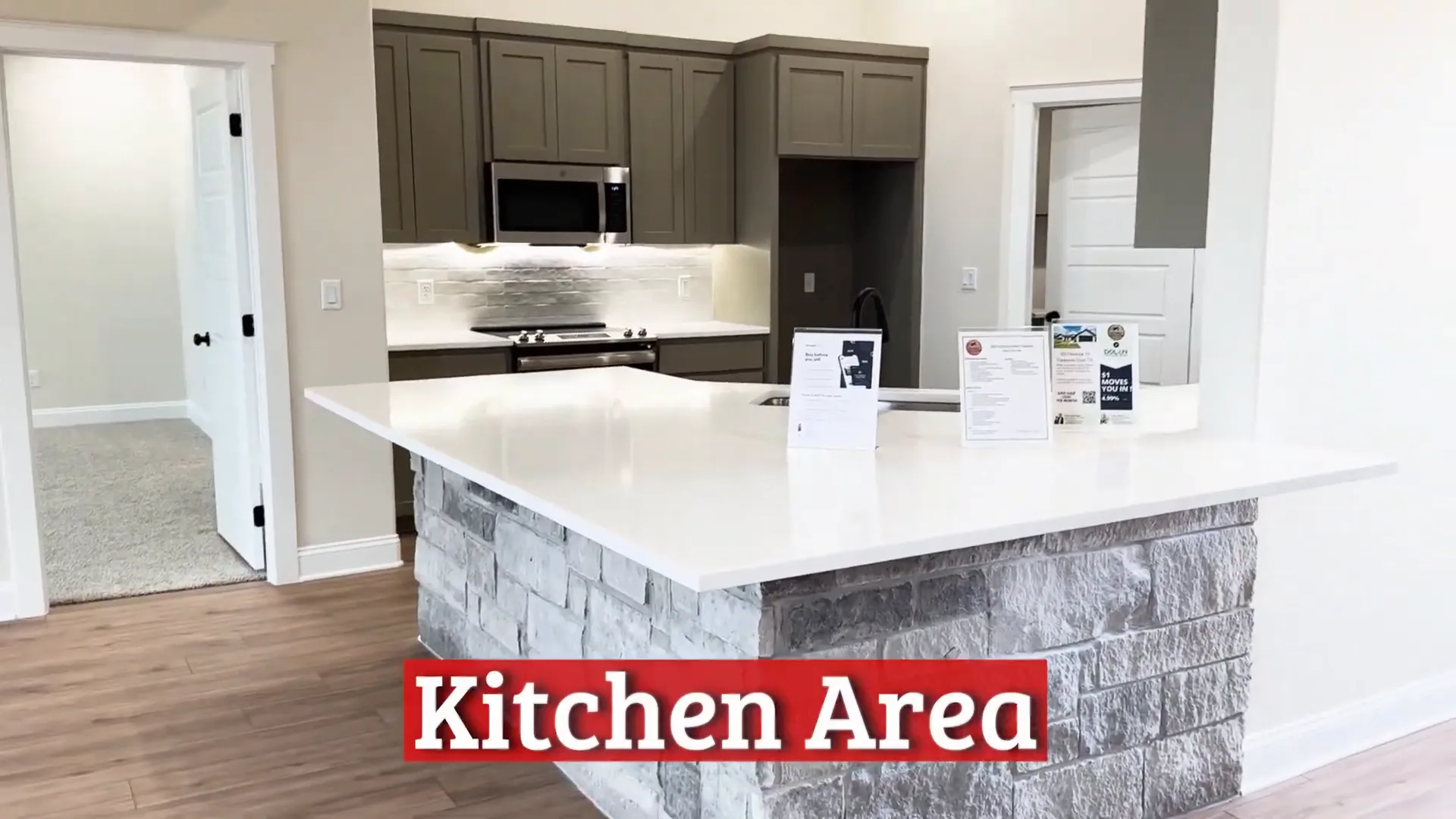 Modern kitchen with stove-oven combo and mounted microwave