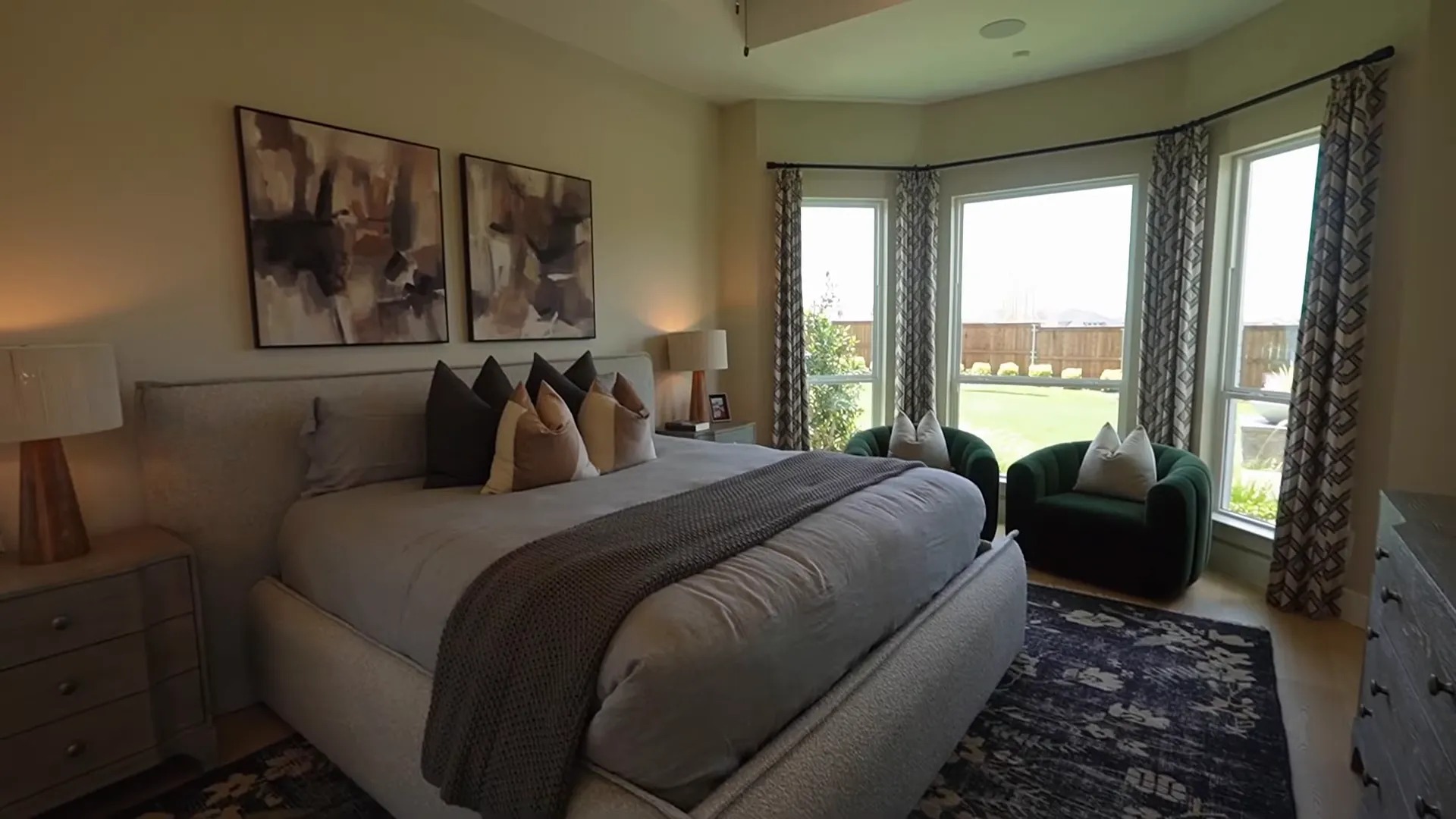 Primary bedroom with bay window bump and tray ceiling
