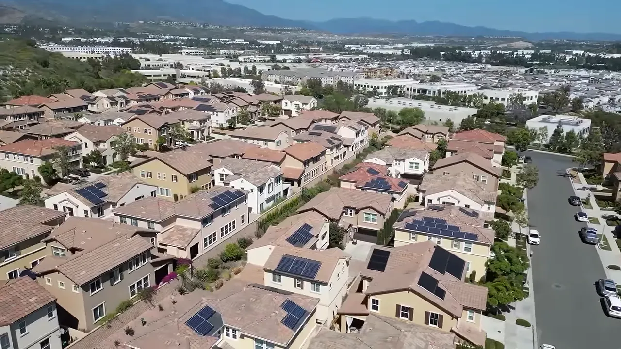 Aerial neighborhood view with topics covered text