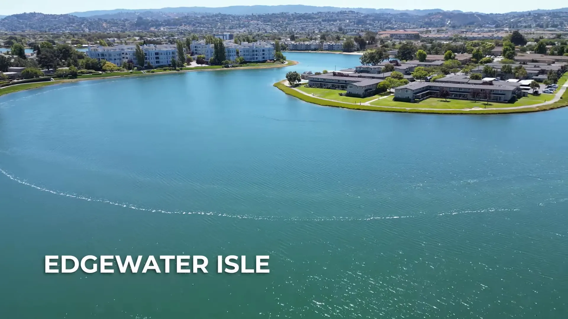 Edgewater Isle lagoon walkway and townhomes