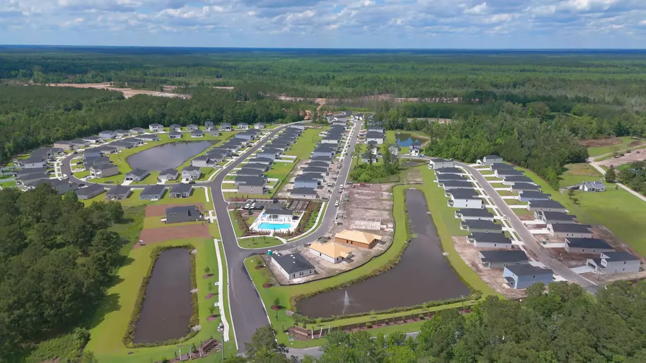 Downtown Conway, SC showing City Hall and Main Street intersection with historic buildings and street activity.