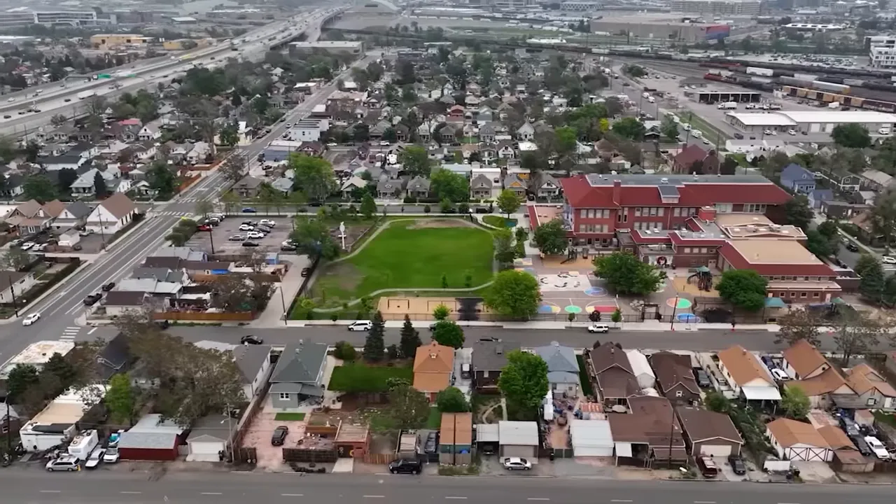 Screenshot of on-screen text explaining Cherry Creek West as a 15-minute community and outlining the redevelopment plan.