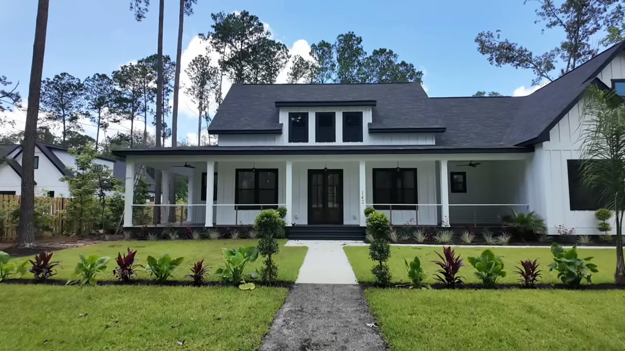 Long covered wraparound porch with recessed lights and ceiling fans