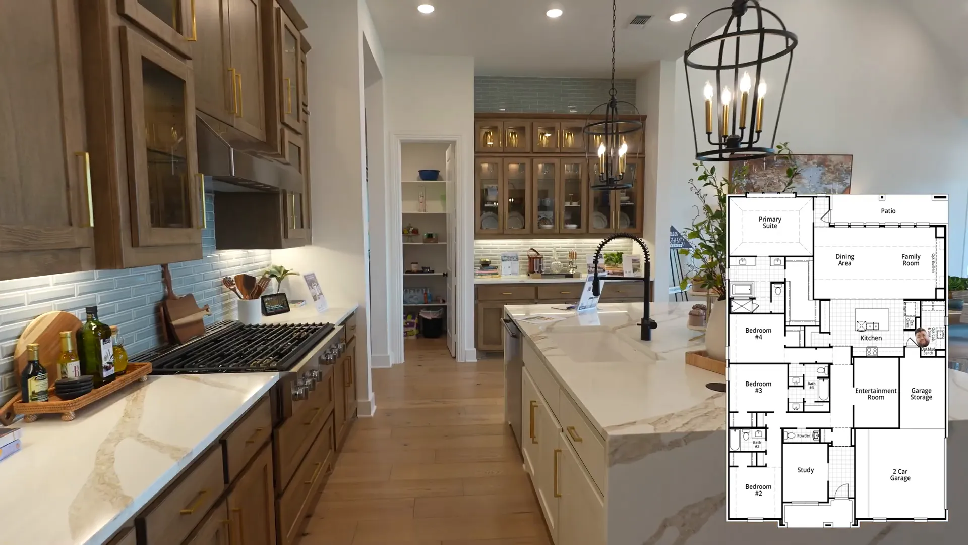 Detail shot: brown cabinetry and blue tile backsplash in the kitchen