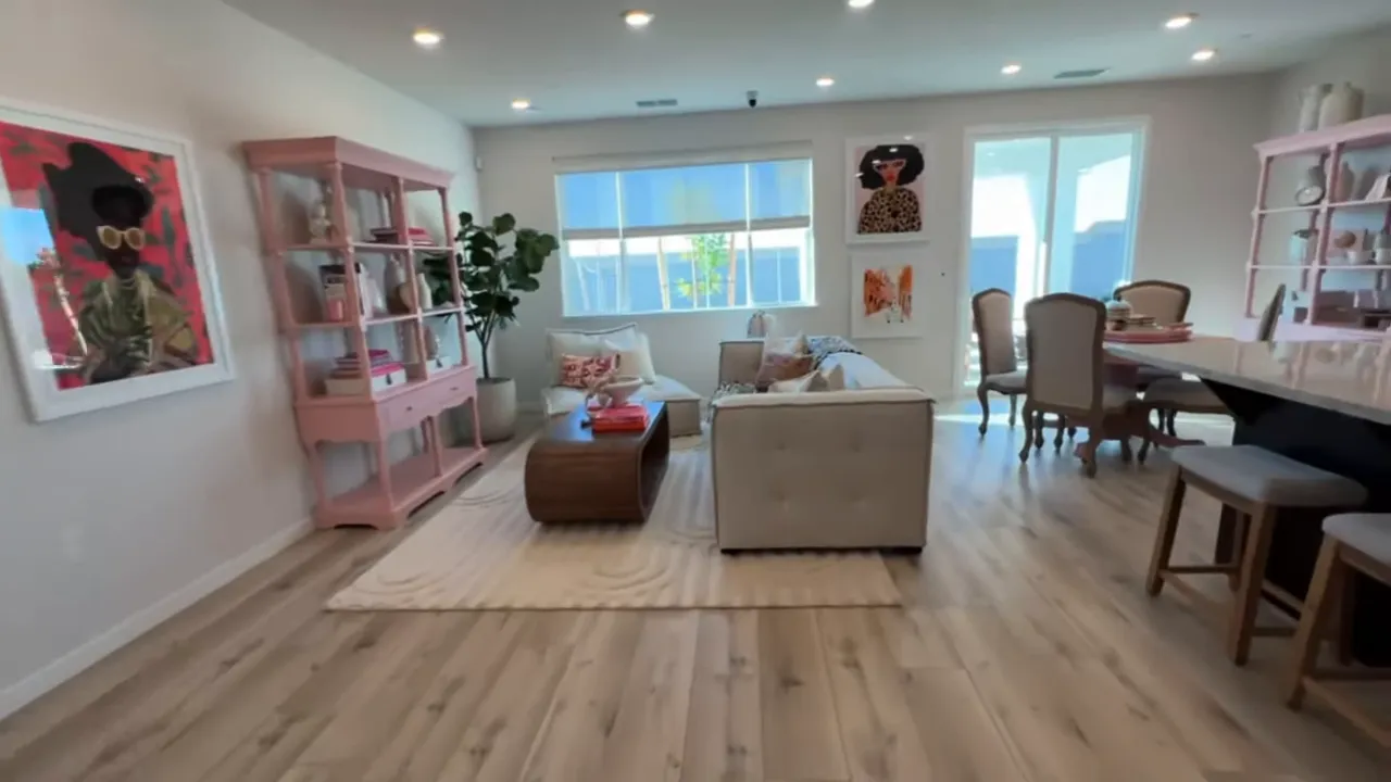 Front door with overlay text 'Residence 1, 1,343 Sq.ft., 3 Bedrooms, 2 Bathrooms, 2 Car-Garage'.