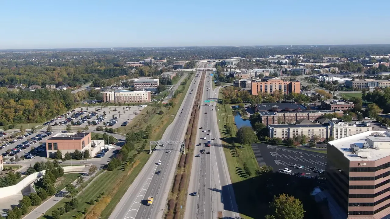 Clean title graphic: '7 Hot Takes on Living in Indianapolis' and a prominent blue text bubble describing hot take #1 about the city's 'boring' reputation being an asset.