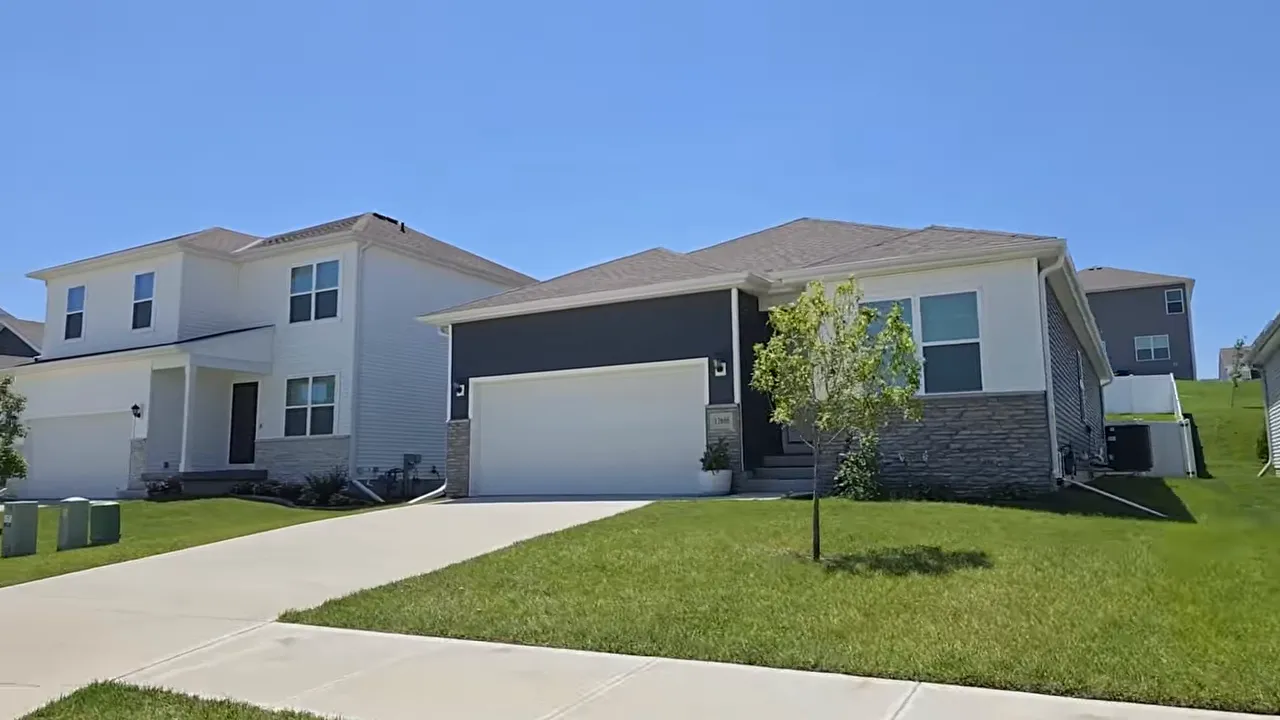 Open concept model home interior with text noting better value and better home