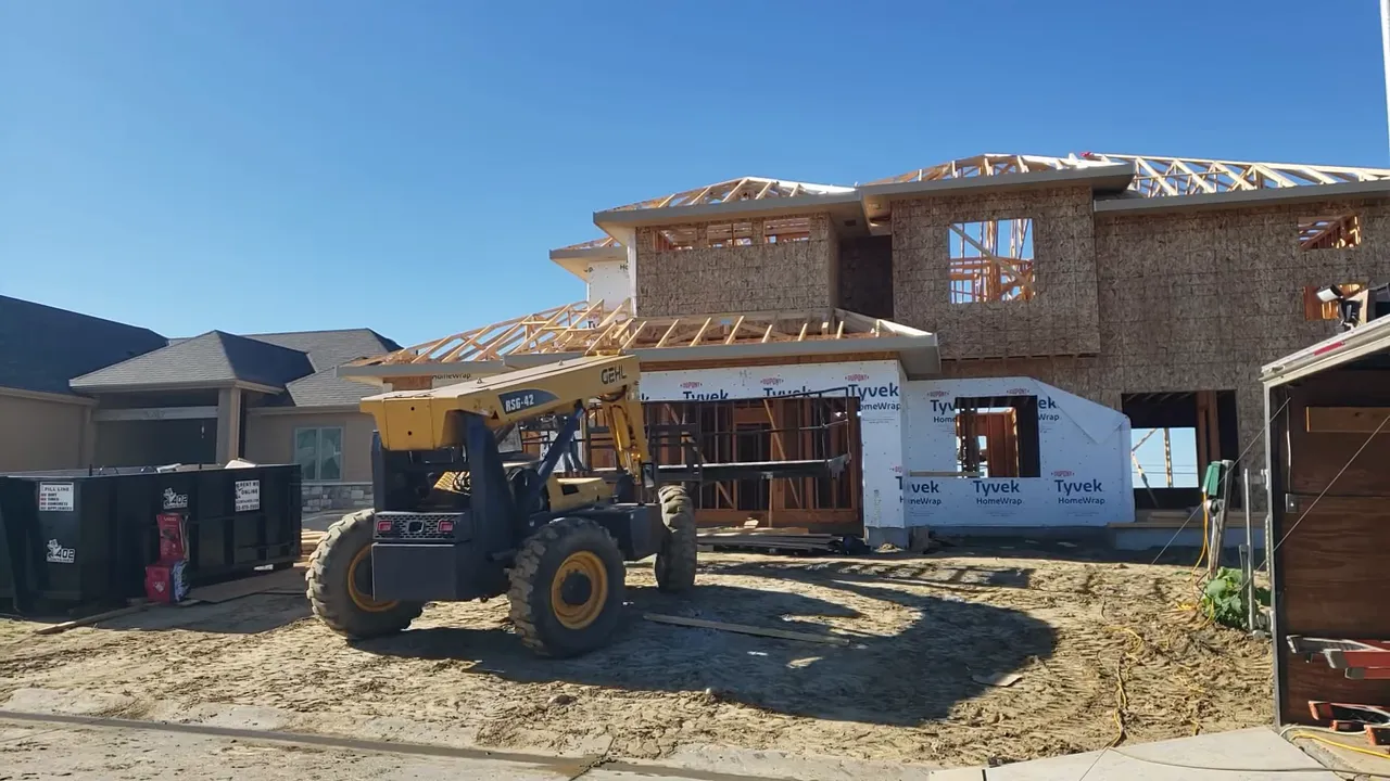 Aerial view showing large Crossroads redevelopment complex under construction in Omaha