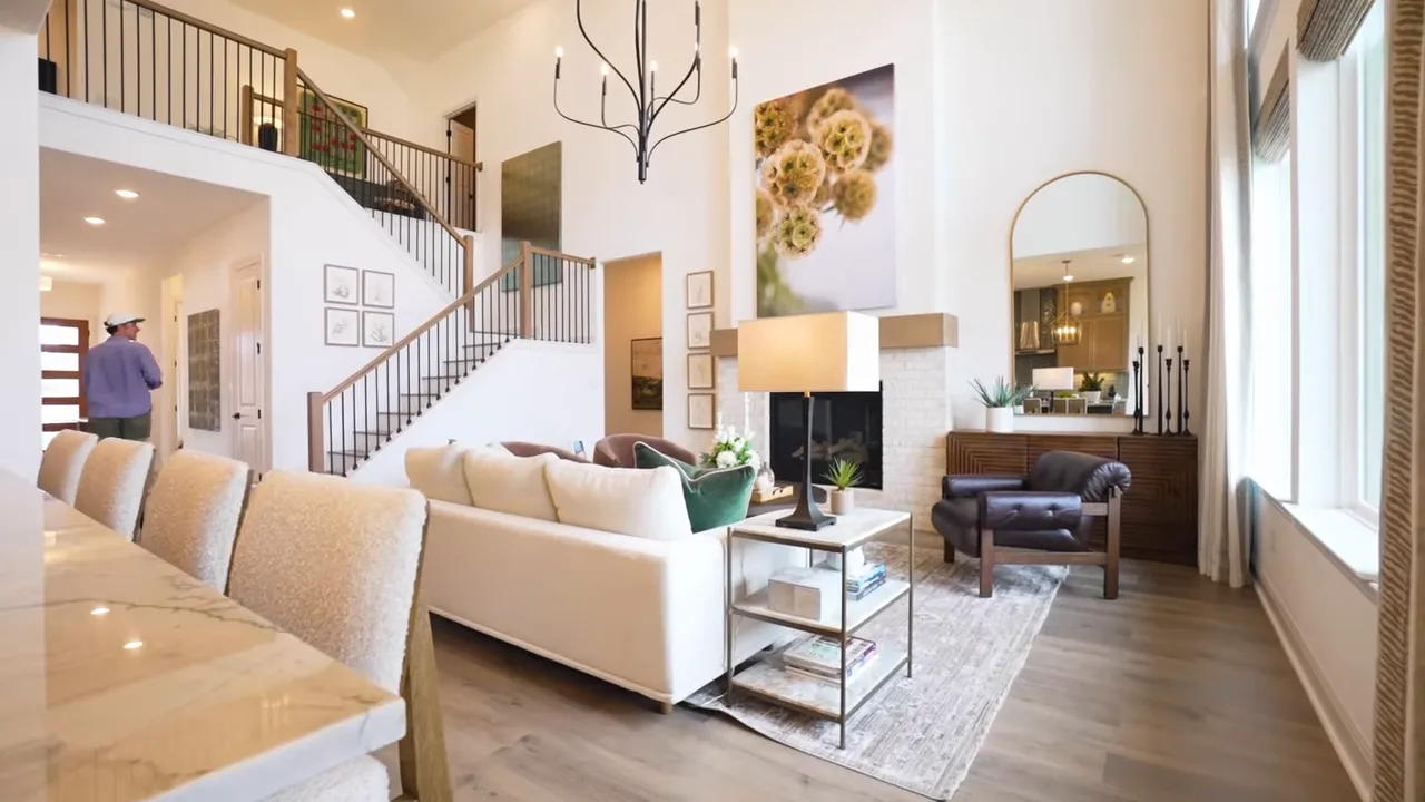 House One kitchen cooktop countertop and cabinetry with green tile backsplash