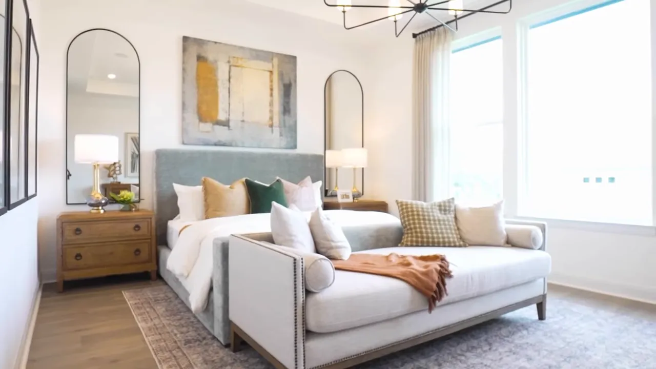 Primary bathroom with freestanding bathtub, glass walk-in shower, dark green tiled wall and vanity